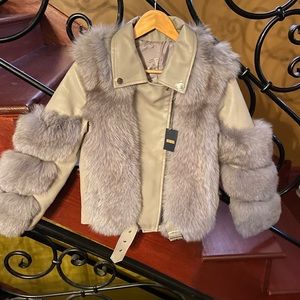 Real leather mink fur jackets. Runs small one size up.